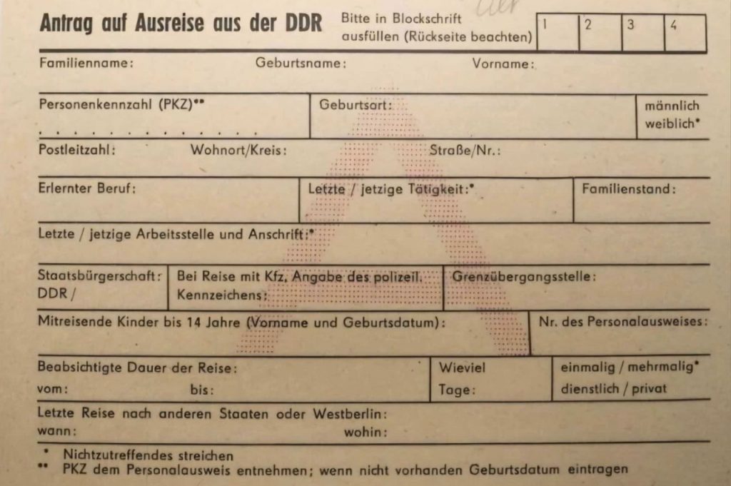 Historical document from East Germany: an official application form for permission to leave the GDR, illustrating how tightly freedom of movement was once controlled.